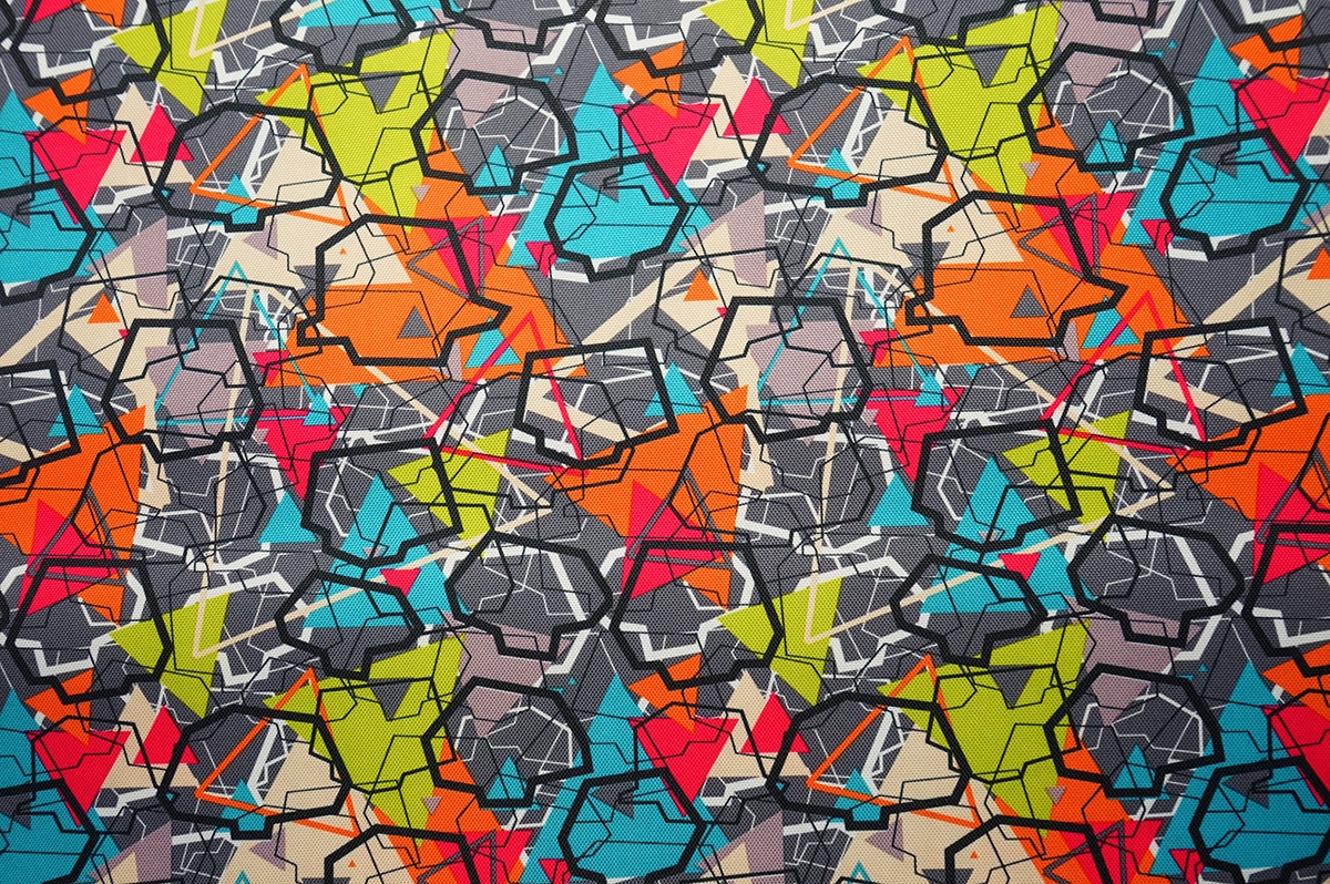 Tkanina ogrodowa - kolorowy, geometryczny wzór - gładka