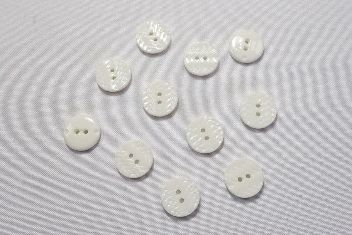 Guzik o numerze 1065, 18 mm