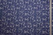 Tkanina sukienkowa - białe kwiatki na granatowym tle